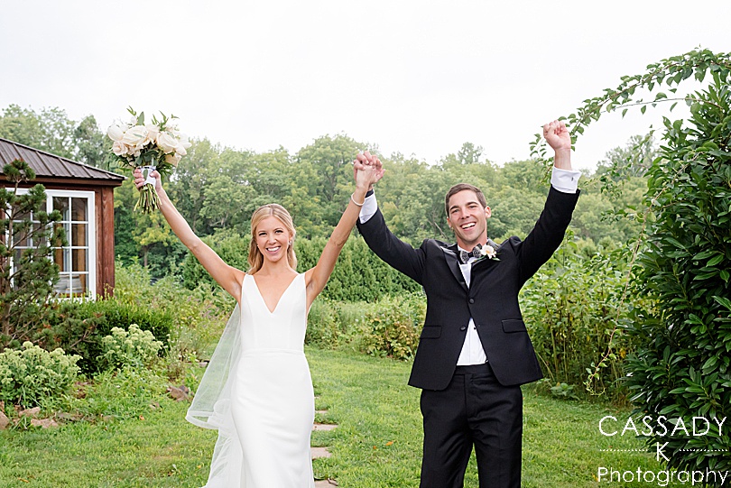 Bride and Groom celebrate finally being married during a Small Ninety Acres Wedding in Natirar of Peapack, NJ