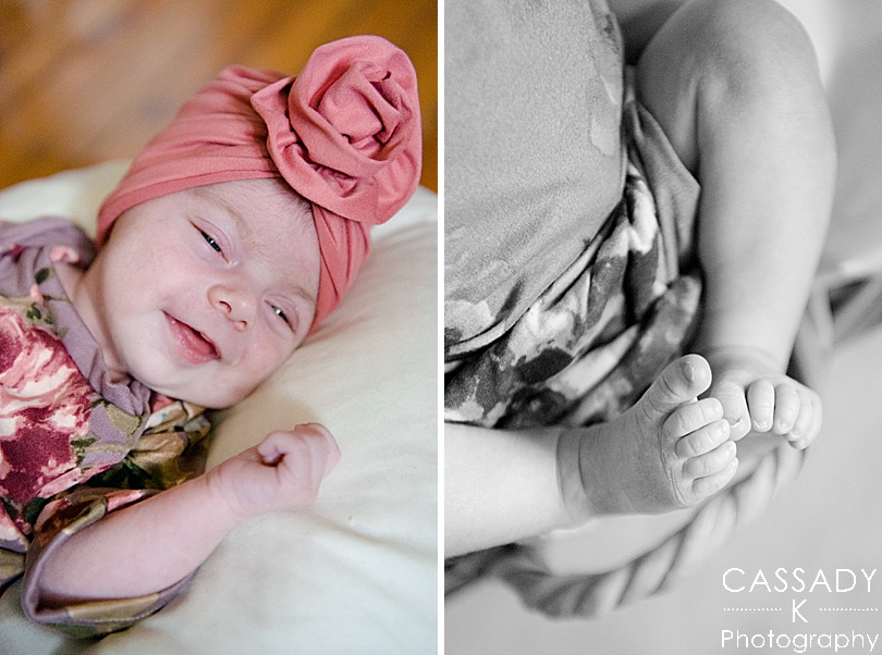 Milk drunk infant wearing a floral coming home outfit with a pink baby turban during an at home Pittsburgh newborn session