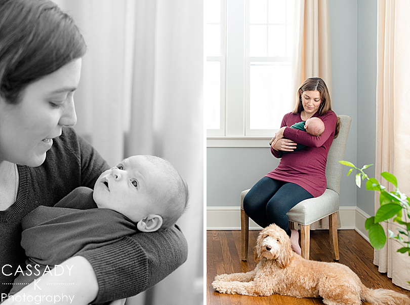 New mom holds baby boy with labradoodle at her feet during a newborn session in Westchester, NY for a 2020 photography review