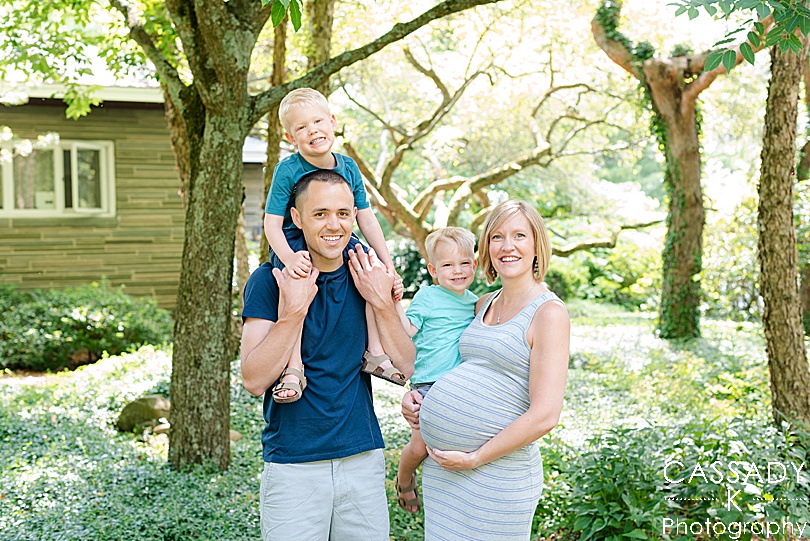 Family picture with two boys during a maternity session outside in Williamsport, PA for a 2020 photography review