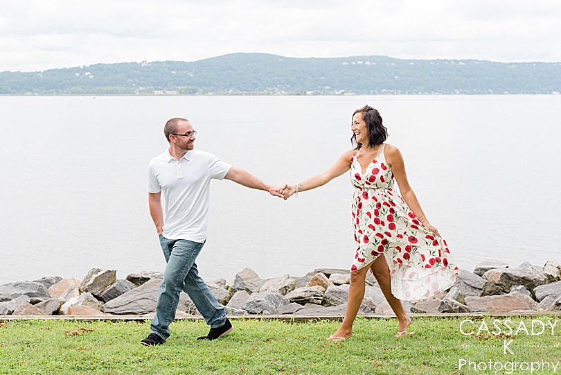 Husband and wife walk in front of the Hudson River at the Scenic Hudson Park in Irvington, NY for a 2020 photography review