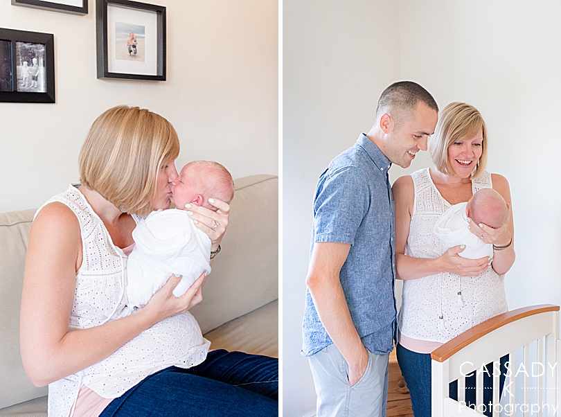 Parents look at their baby boy in his crib during a newborn session in Williamsport, PA for a 2020 photography review