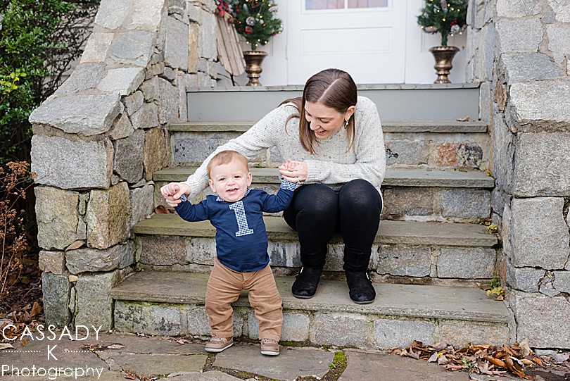 One year old boy with his mom outside for his at home first birthday pictures in Westchester County, NY