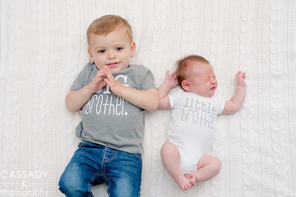 Big brother and littler brother picture during Bedford newborn picture session in NY