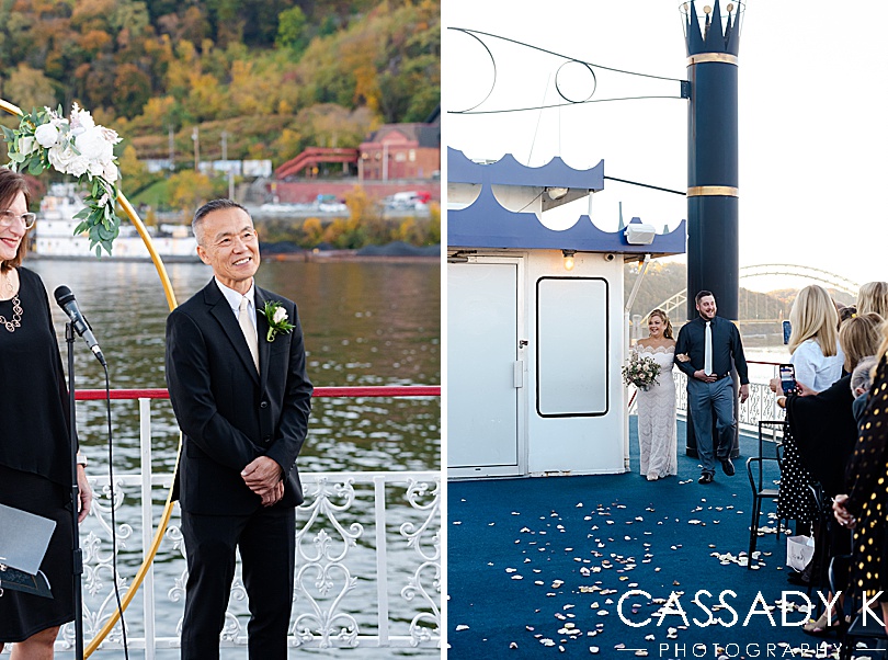 Groom standing and bride walking down aisle at fall Gateway Clipper wedding