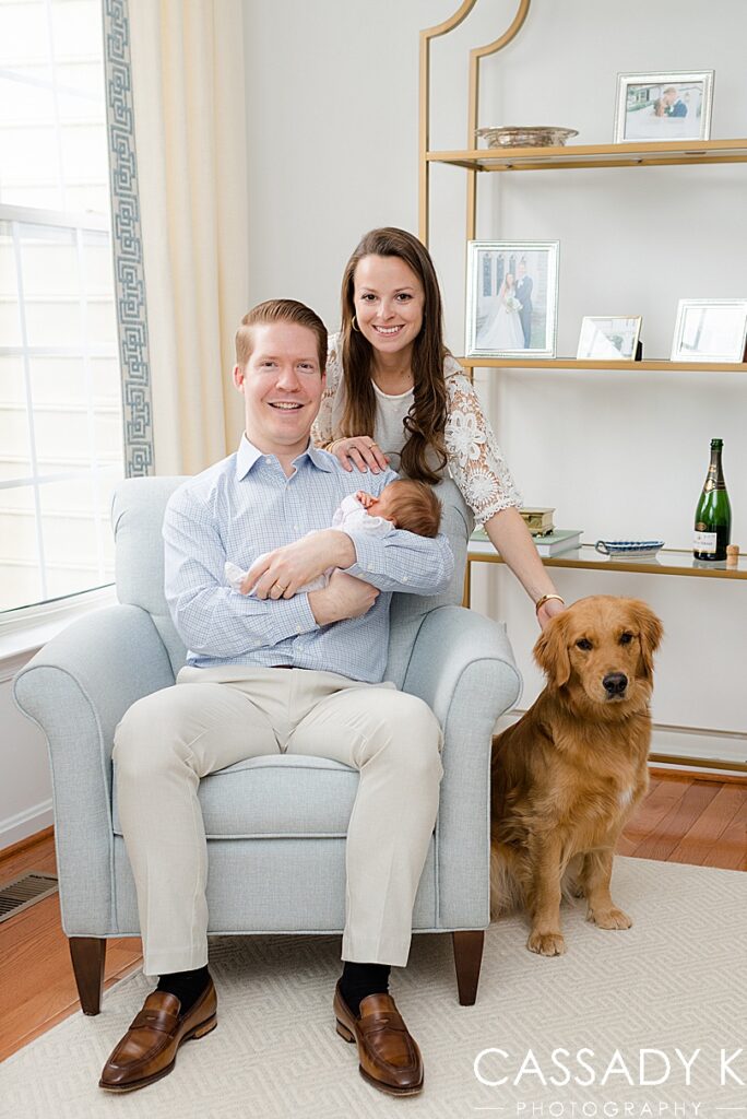 Family portrait with their Golden Retriever at their Doylestown, PA home.