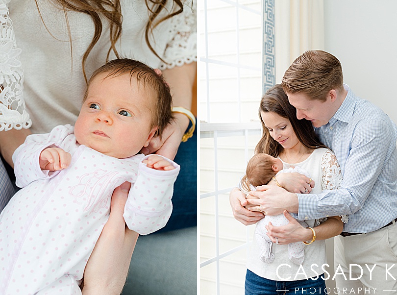 Each parent holding baby girl during Doylestown PA newborn pictures. 
