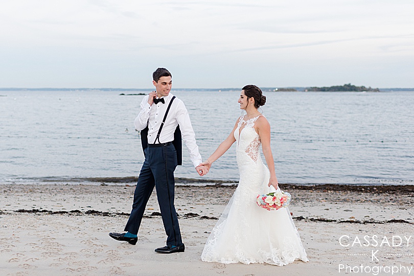 Bride and Groom walking on the beach at a Surf Club on the Sound Wedding in New Rochelle, NY