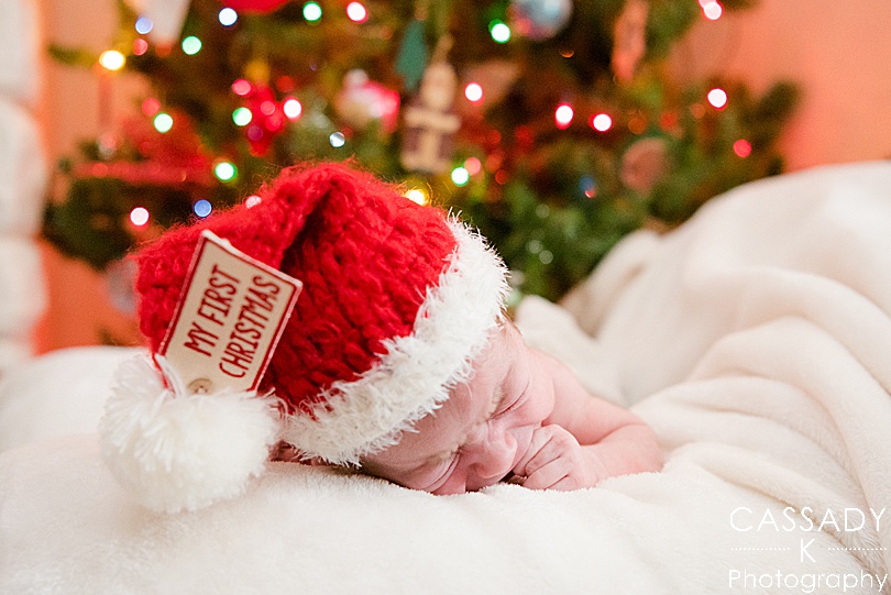 A not so silent night during an at home Pittsburgh newborn session during Christmas time