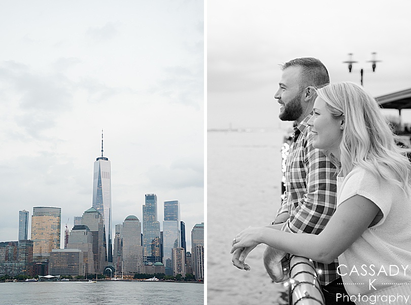 Engaged couple looks out at the New York City skyline during their Jersey City Engagement Session in NJ