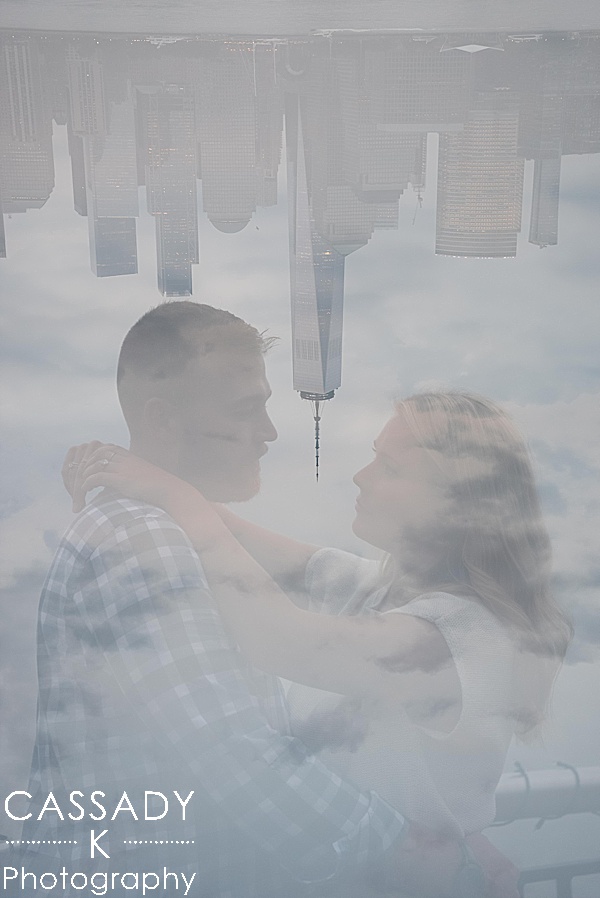 Double exposure of engaged couple and the NYC skyline during their Jersey City Engagement Session in NJ