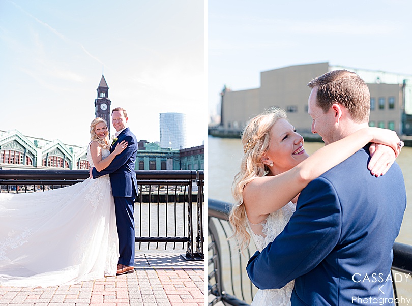Wedding pictures of bride and groom on Pier A with clock tower during an Antique Loft Hoboken Wedding