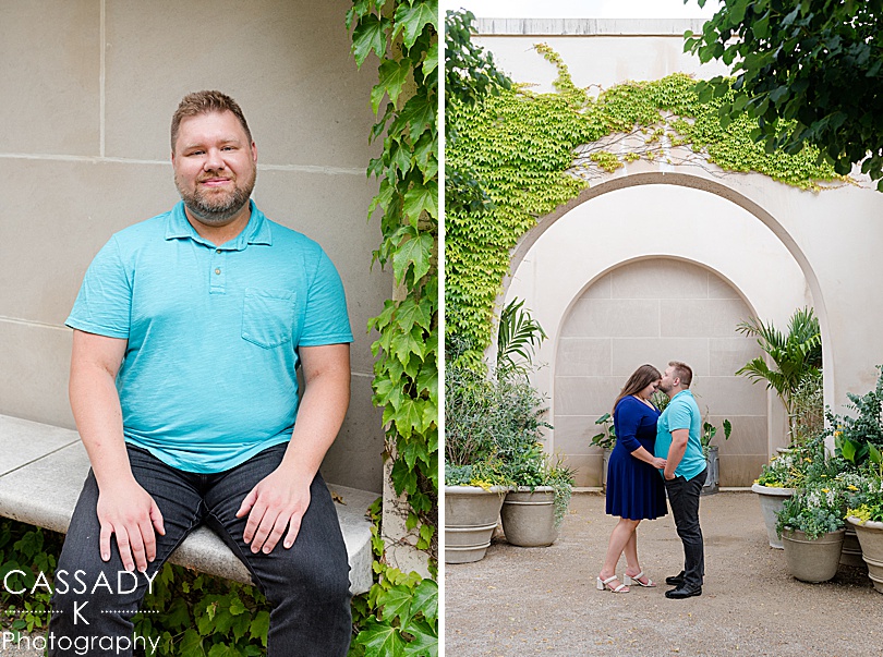 Engaged couple standing under arches at Longwood Gardens