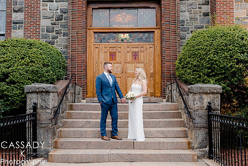 Bride and groom in front of church at Spring Tokeneke Club Wedding