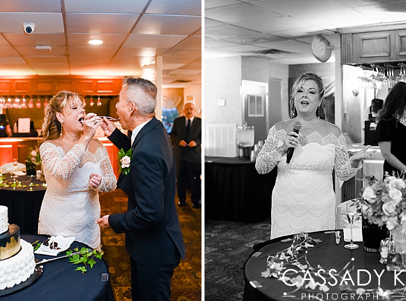 Bride and groom eating cake at fall Gateway Clipper wedding