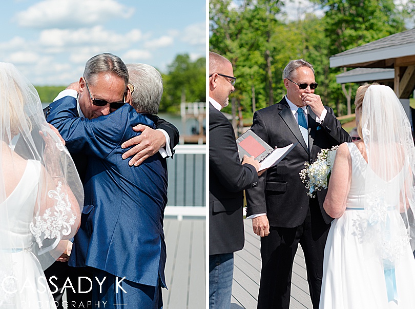 Groom hugging father and getting emotional when seeing his bride at their small wedding on Lake Anna, VA