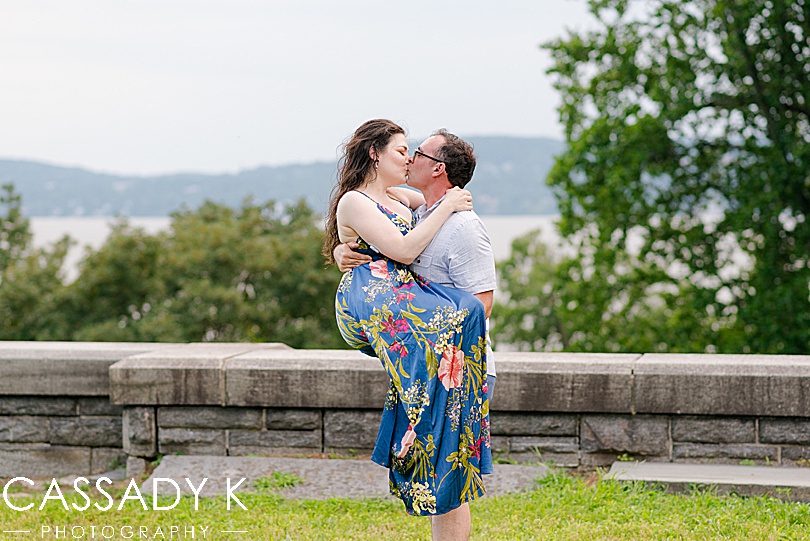 Man holding woman and kissing during Rockwood Hall engagement photos