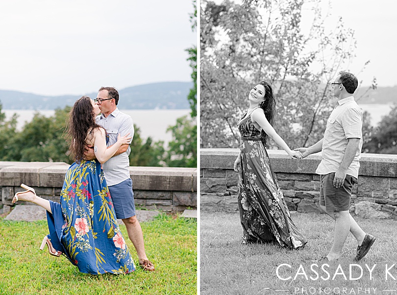 Man and woman walking in front of Hudson river during Rockwood Hall engagement photos