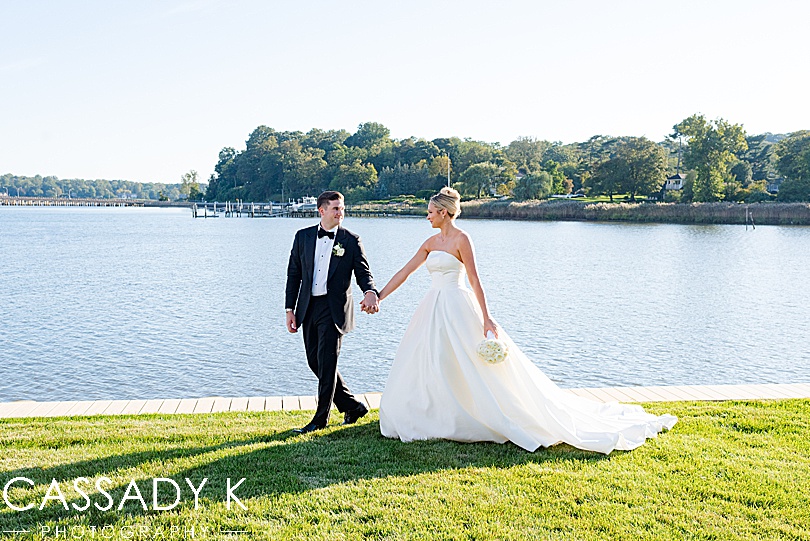 Bride and Groom in front of river at Private Estate Tented Wedding