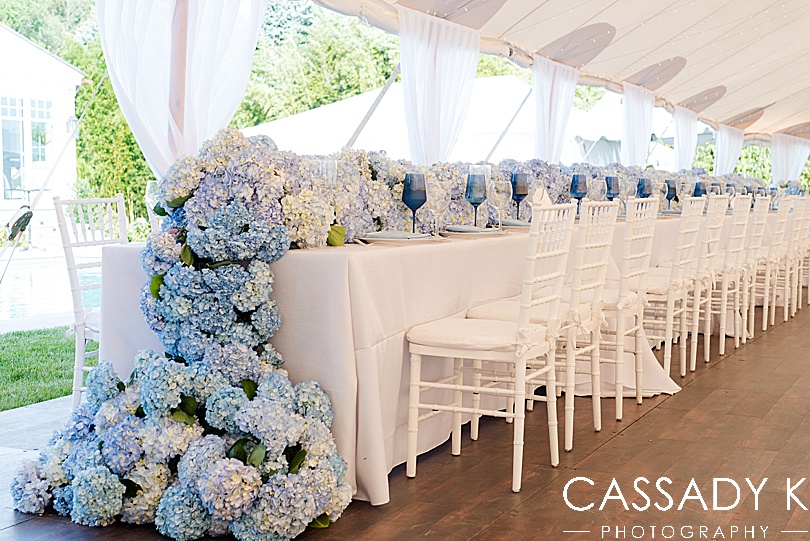 Blue hydrangea waterfall centerpiece in Private Estate Tented Wedding
