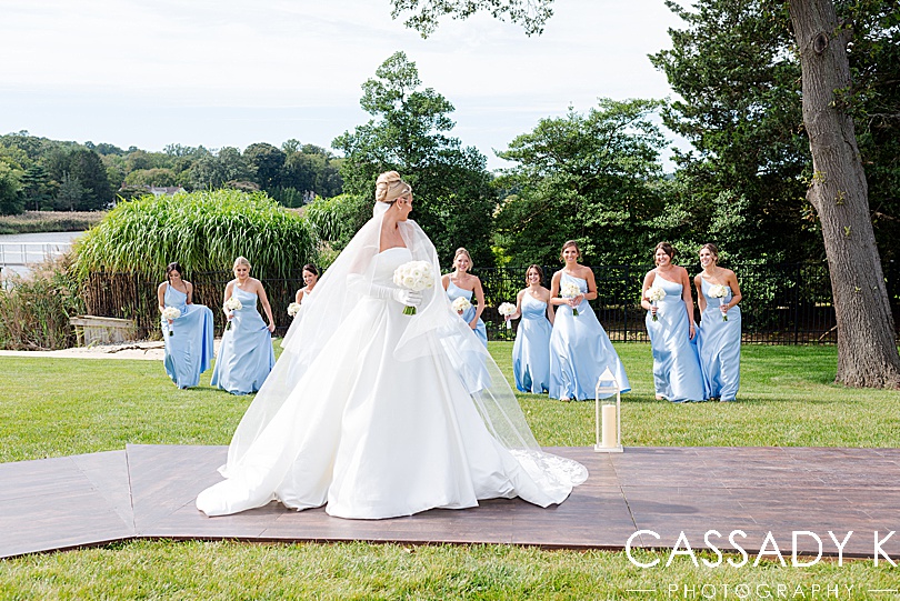 Bride outdoors in backyard of Private Estate Tented Wedding