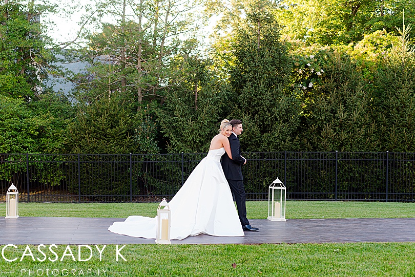 Bride and groom hugging in early fall wedding in New Jersey