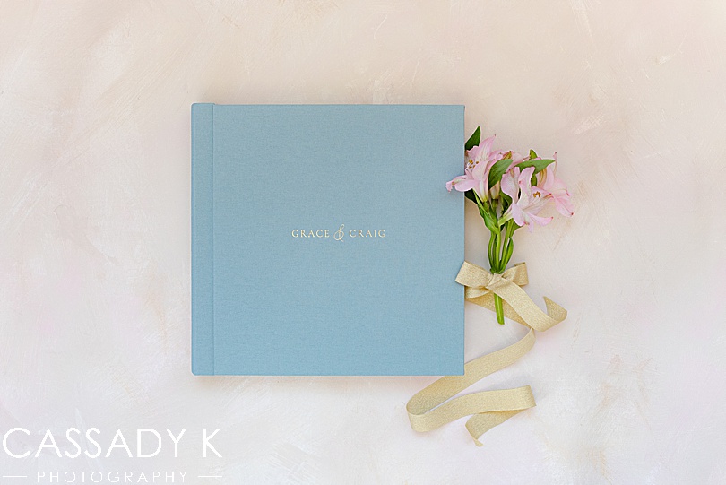 Teal wedding album cover for a Ninety Acres Wedding