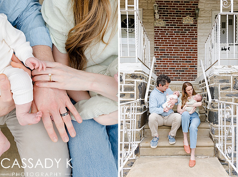 Mom and dad on front porch holding twin babies in Philadelphia Lifestyle Newborn Session
