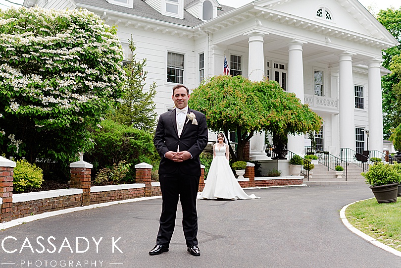 Groom in front of Briarcliff Manor