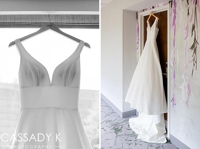 Wedding dress hanging on door frame