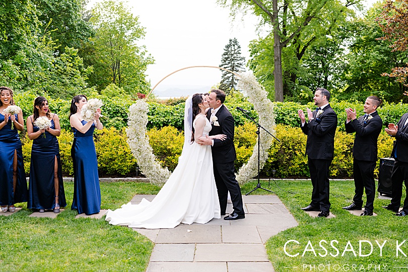 Bride and groom kissing at Briarcliff Manor Wedding