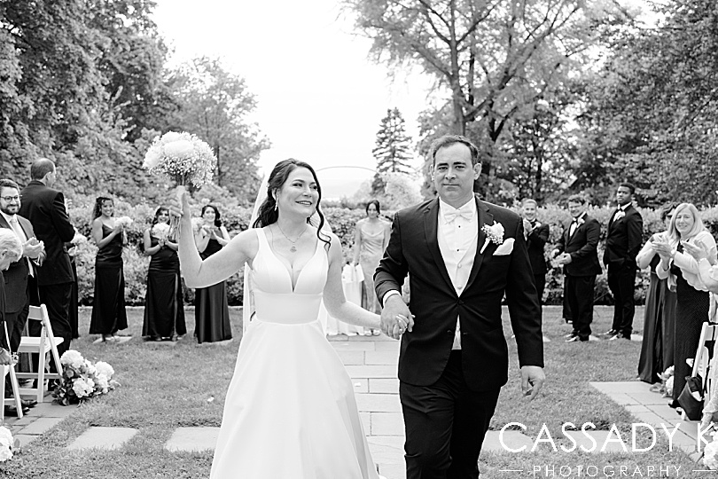 Bride and groom exiting ceremony at Briarcliff Manor Wedding