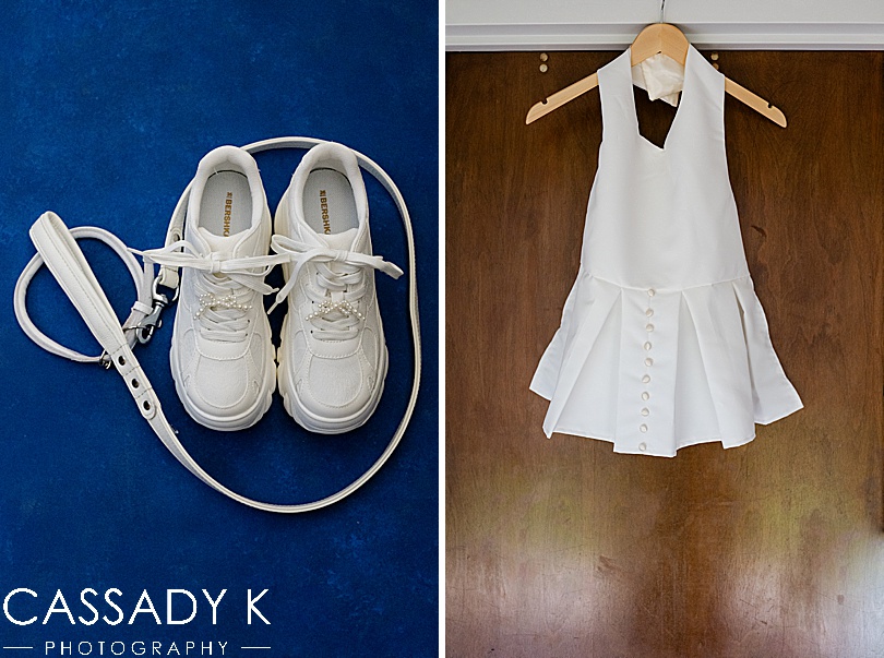 Detail shot of brides shoes and dog leash and dress for Briarcliff Manor Wedding