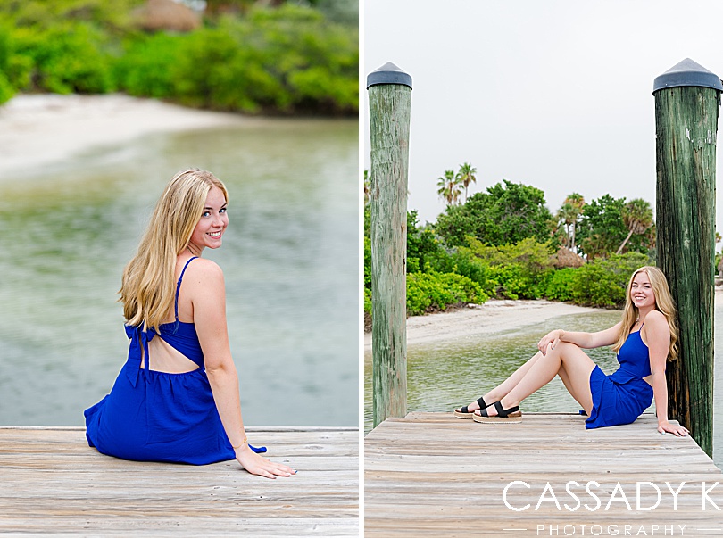 Girl sitting on pier in blue dress during Longboat Key Senior Portrait Session