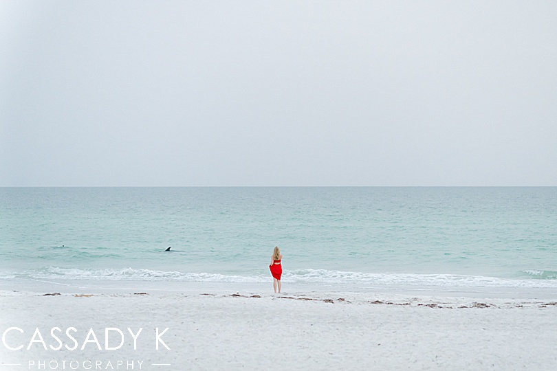 Girl with red dress on Longboat Key beach