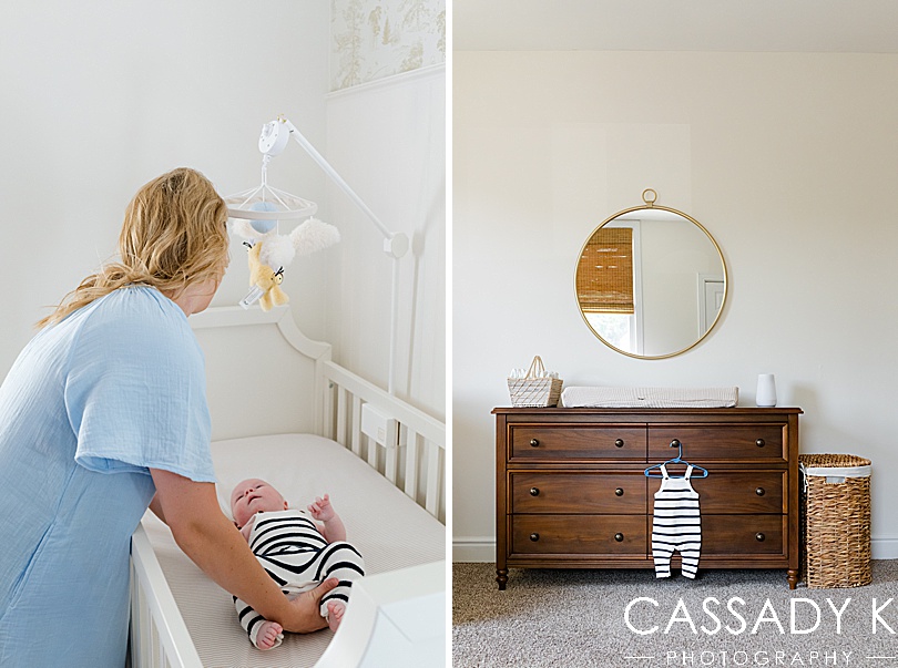 Mom laying baby boy down in white crib during a growing family lifestyle session in Pittsburgh