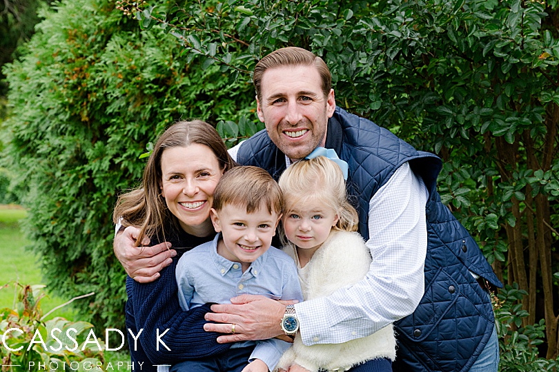 Family hugs in tight during fall mini session.