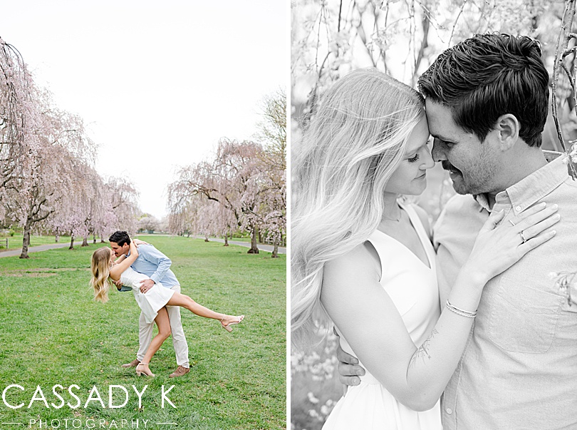 Husband dips his wife in the middle of the pink Cherry Blossom trees in Fairmount Park, Philadelphia