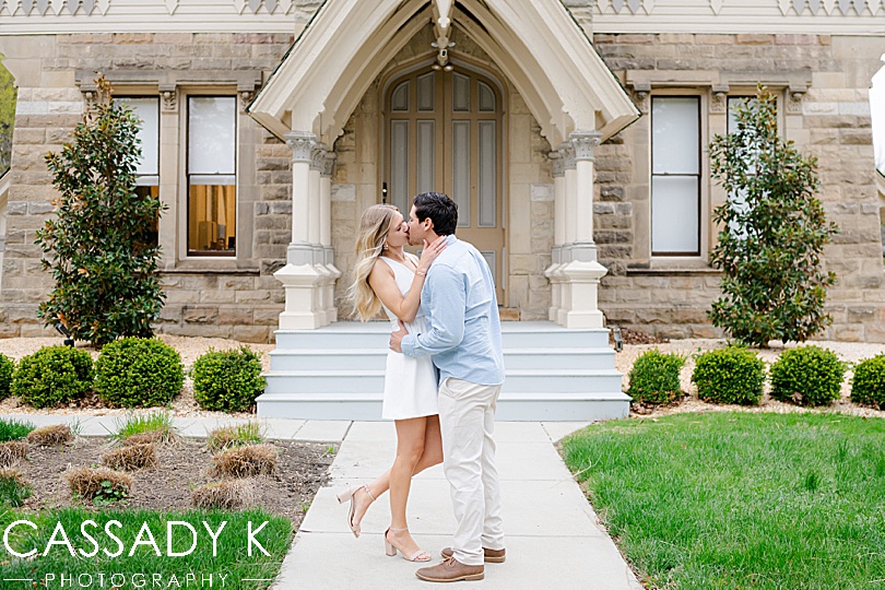 Couple kisses in front of the Ohio House during the Cherry Blossoms in Fairmount Park, Philadelphia