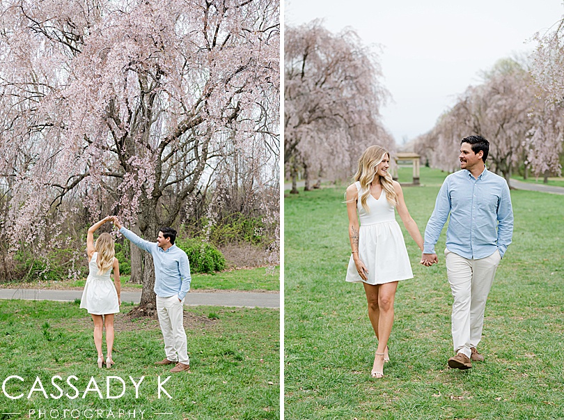 Tim spinning Danielle under the blooming Fairmount Park Cherry Blossoms in Philadelphia, PA